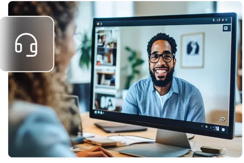 Person in a video call on a desktop monitor
